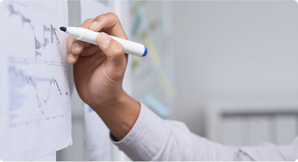 Image of a man writing to the writing board